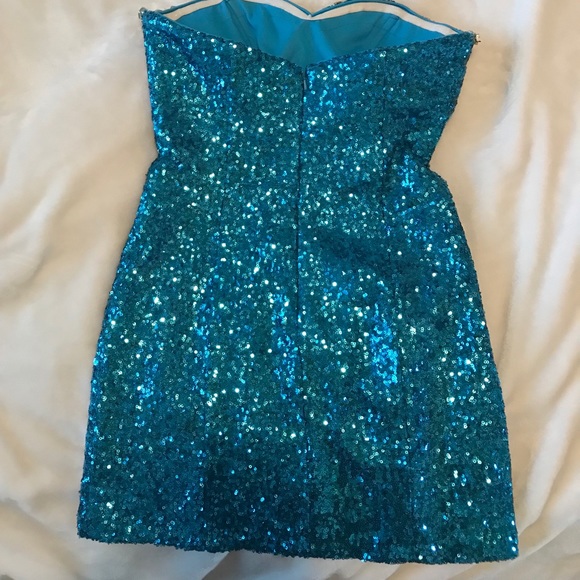 A Blue sequin cocktail dress. - Picture 2 of 3